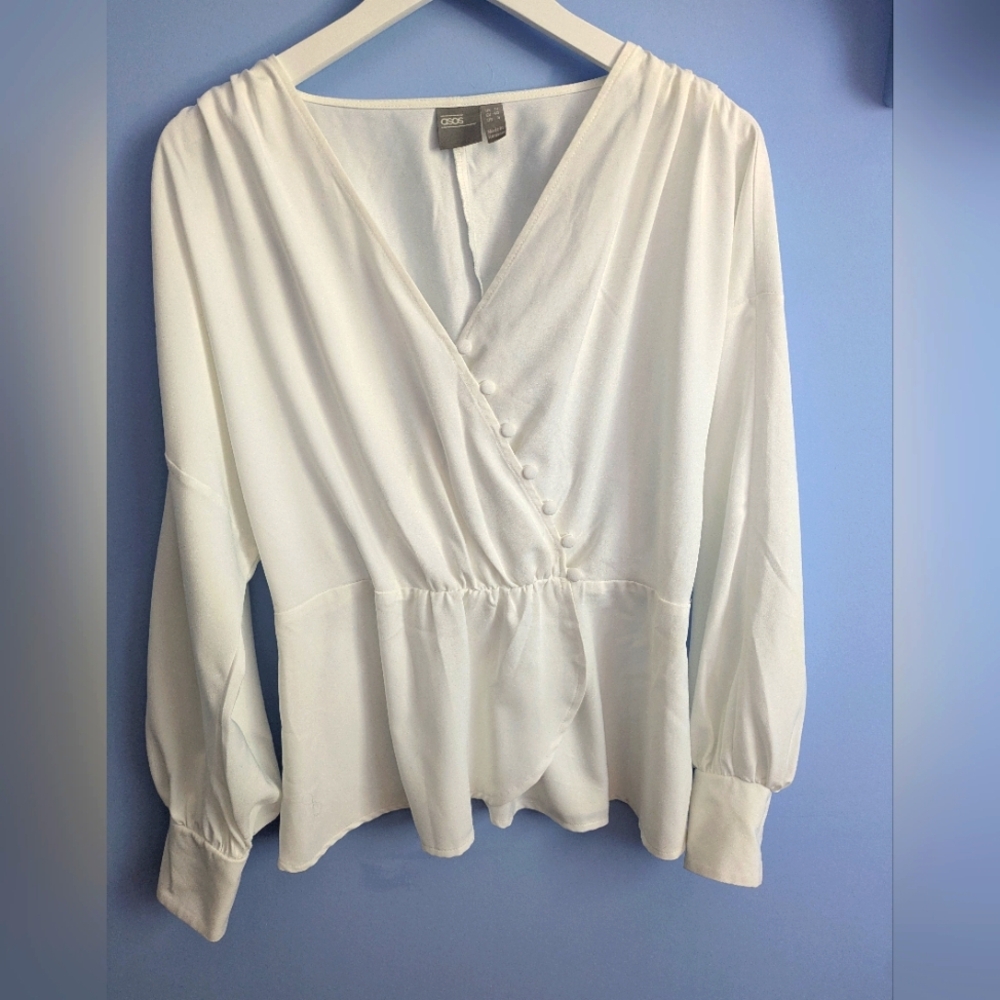 Elegant White Peplum Blouse With Button Details